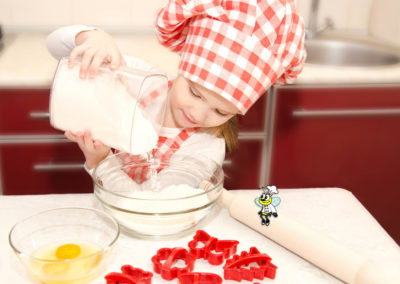 Little-girl-making-cookie-dough-